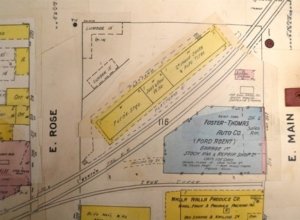 The July 1929 update to the 1905 Sanborn map shows the passenger depot gone. The freight depot remains as furniture storage, sash and door warehouse and second-hand sacks and tires.