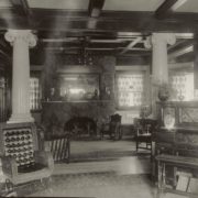 The library as seen from the living room. Note the Moss Rock fireplace designed by John Langdon. Whitman Archives photo.